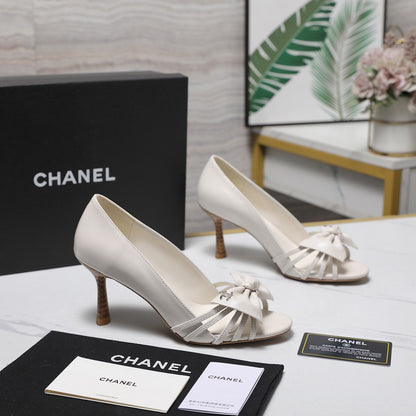 Chanel 2026 Bow Strappy High-Heeled Peep Toe Sandals White Cowhide 758431
