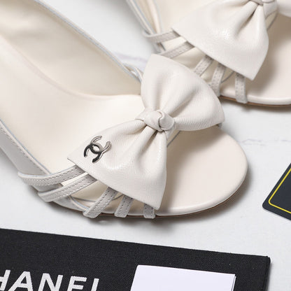 Chanel 2026 Bow Strappy High-Heeled Peep Toe Sandals White Cowhide 758431